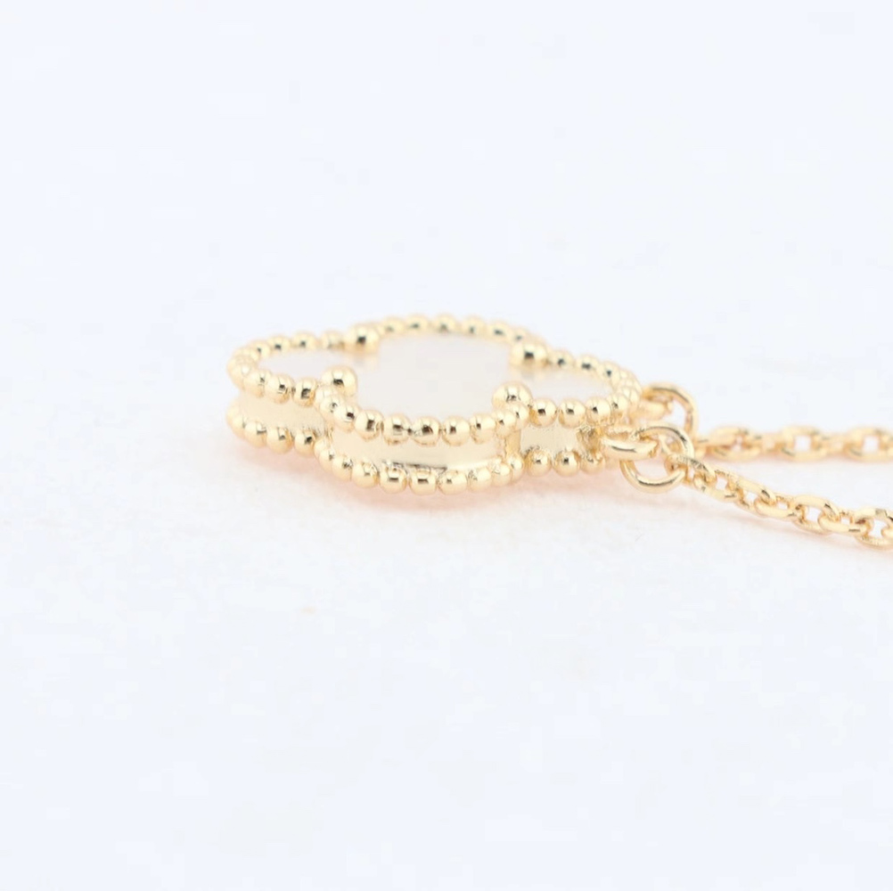 Van Cleef & Arpels, Gold,White Shell Necklaces